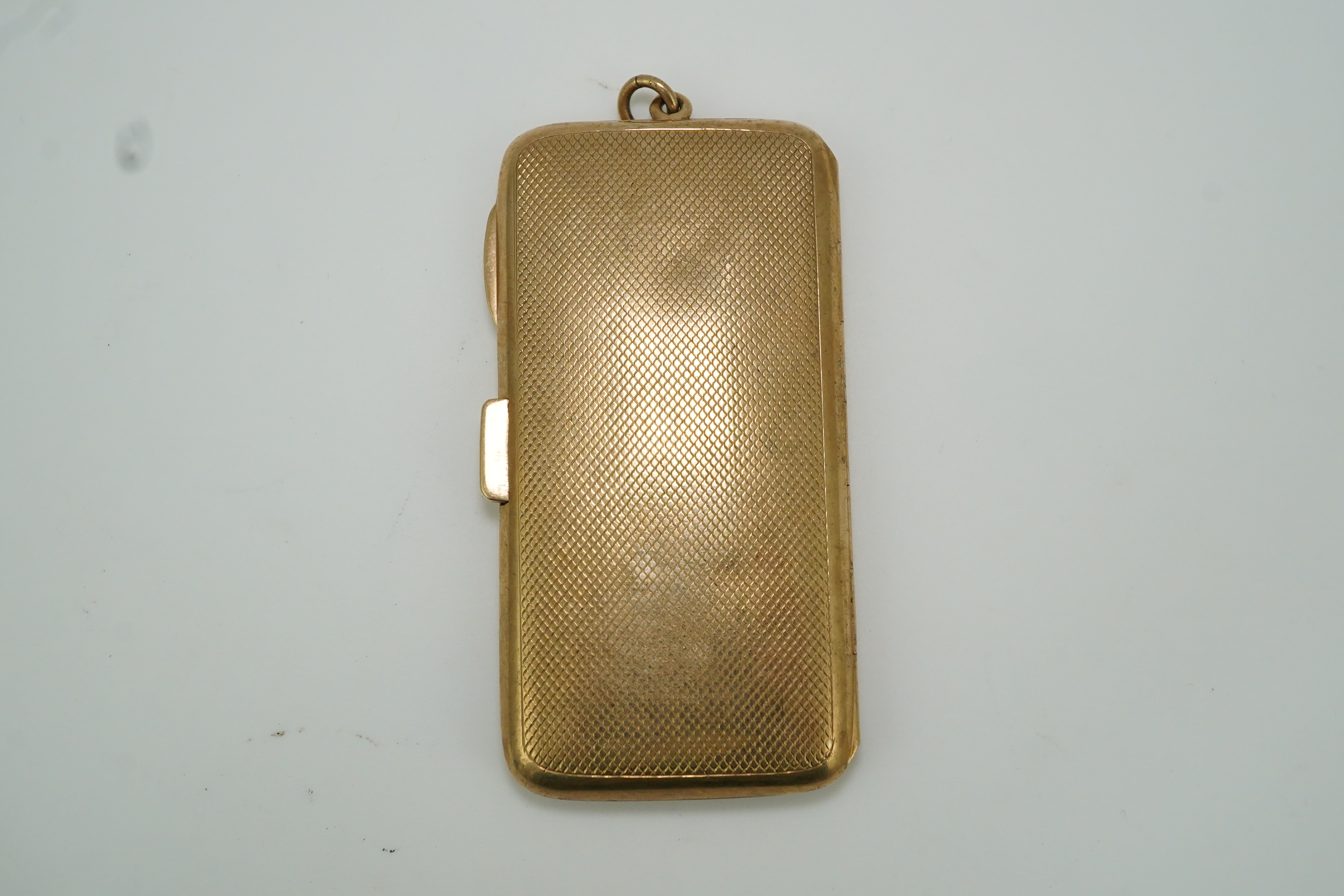 A George V 9ct gold cigarette case, circa 1919